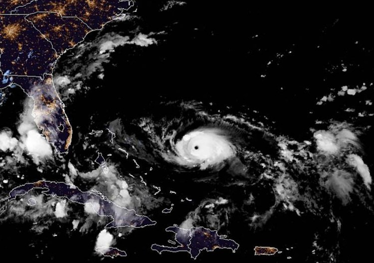 A satellite view of Hurricane Dorian taken at 10 p.m. EDT on Friday. It has become more likely that coastal Georgia and the Carolinas will have to deal with serious effects from Dorian by the middle of next week.