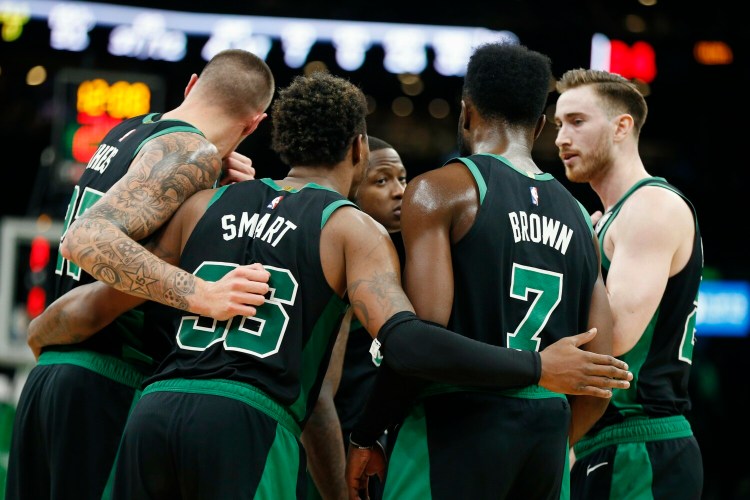 Marcus Smart, second from left, and Jaylen Brown, second from right, are two of four Boston Celtics players at the U.S. men's basketball team's training camp for the upcoming World Cup.