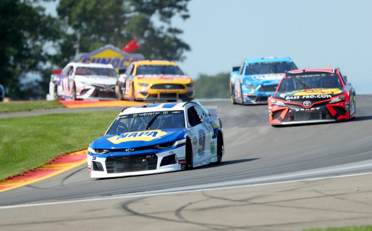 Chase Elliott held off Martin Truex Jr. to win the NASCAR Cup series race at Watkins Glen for the second straight year. 