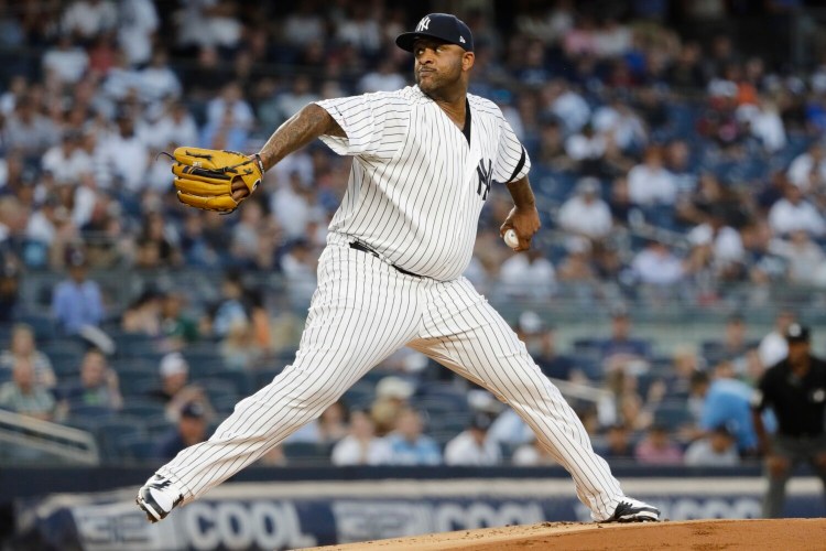 CC Sabathia was placed on the disabled list by the New York Yankees with right-knee soreness.