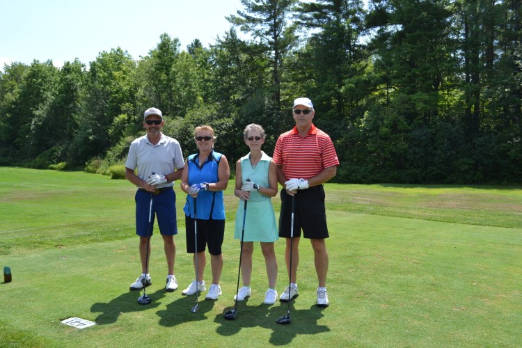 Exclusive Cart Sponsor Central Maine Power golf team members from left are Tim Robbins, Carol Bradel, Susan Clary and Eric Stinneford.