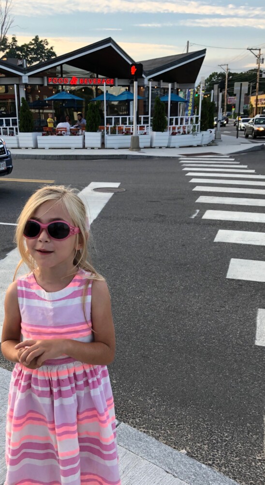 Is six-year-old Margaux Boger wearing sunglasses so Woodford Food & Beverage won't know she is coming to critique them?