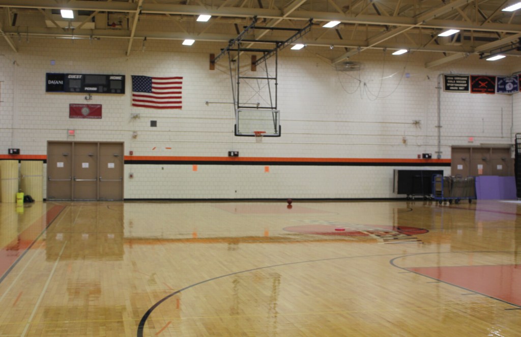 The gymnasium of Skowhegan Area High School, where a mural depicting the school's former Native American sports nickname and mascot has been painted over. 