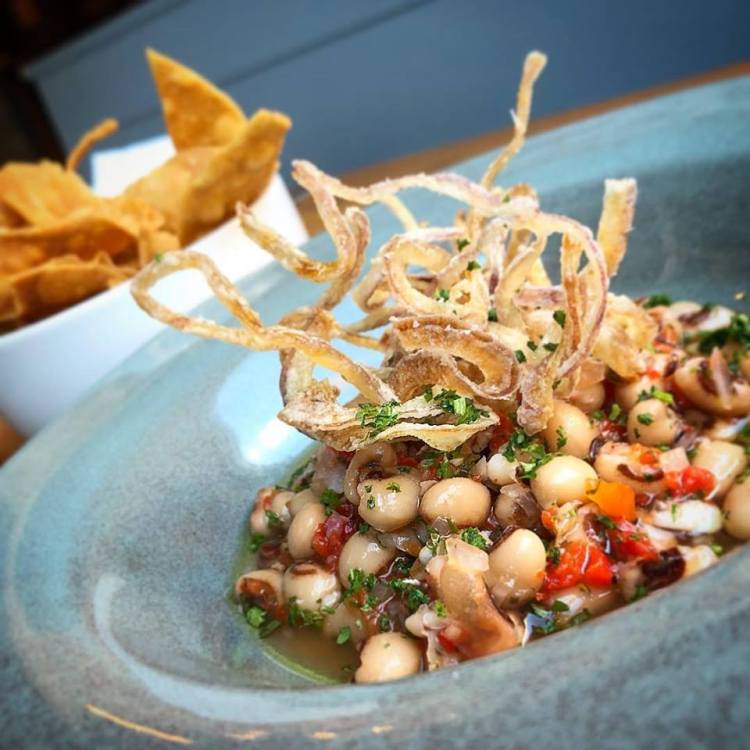 The black-eye pea escebech at Sur Lie often appears on vegan tasting menus at the Portland restaurant. You can find multi-course vegan tasting menus at a number of restaurants here. 