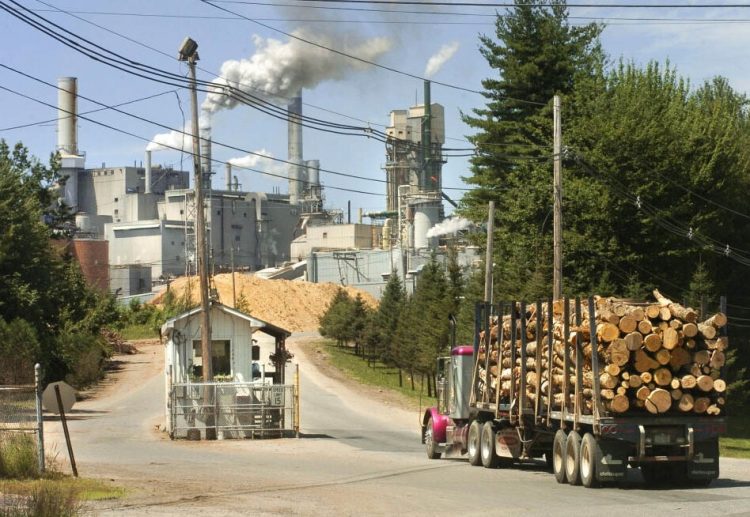 Logs are delivered to the Androscoggin Mill in Jay in 2005. Former owner Verso Corp. said Monday that it has sold the mill to a Pennsylvania company, Pixelle Specialty Solutions.