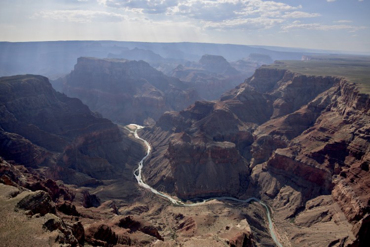 The confluence of the Little Colorado River, foreground, and the Colorado River is seen in Grand Canyon National Park in Arizona.