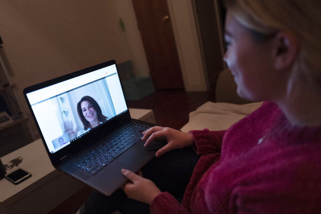 A patient does a video chat with a doctor. Many employers offer such a virtual option, but just 8 percent of employees used telemedicine in 2017.