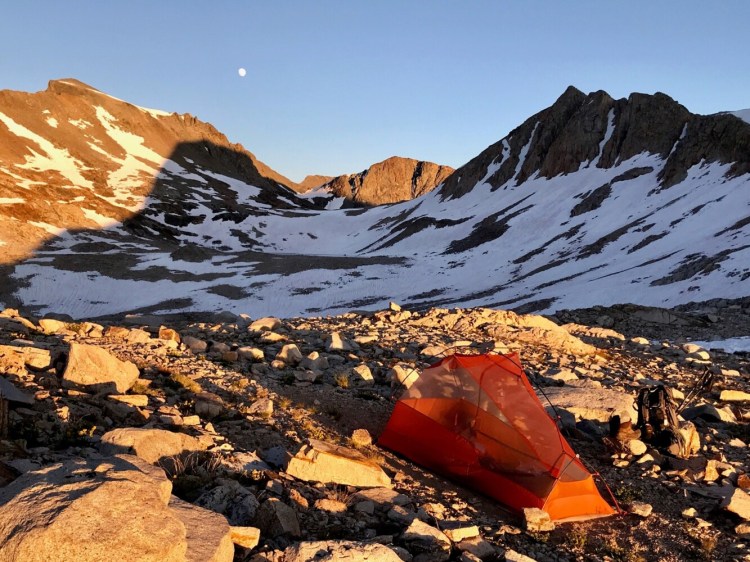 Columnist Carey Kish's camp at moonrise atop 11,969-foot Muir Pass in California. Kish is 1,700 miles and 4 1/2 months into hiking the Pacific Crest Trail. 