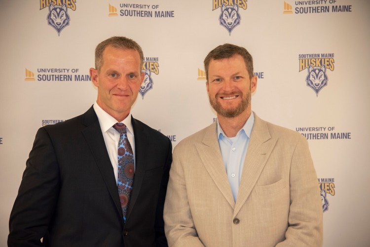 Dale Earnhardt Jr., right, with USM alumnus Mickey Collins after a speaking engagement at USM on Thursday.