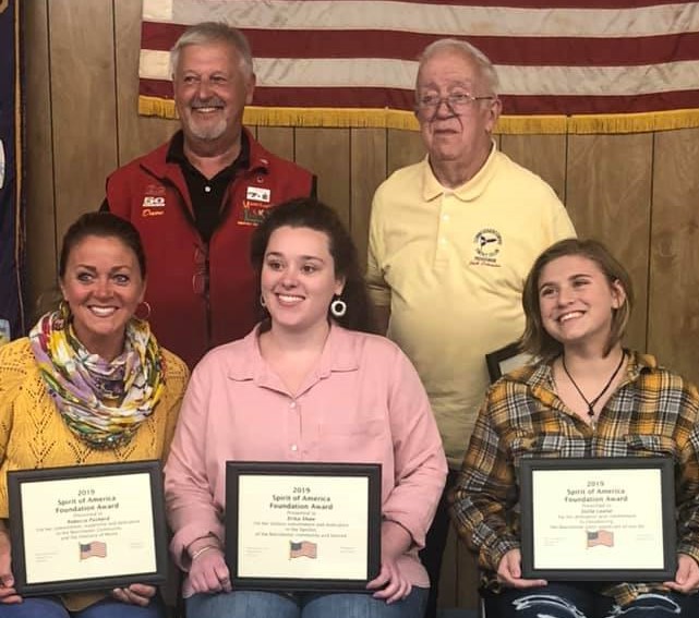 Front from left are  Spirit of America Foundation Award recipients Rebecca Pushard, Erika Shaw and Stella Lauter. Back from left are Dave Worthing, chairman of the Manchester Spirit of America; and award recipient Jack Schrader.