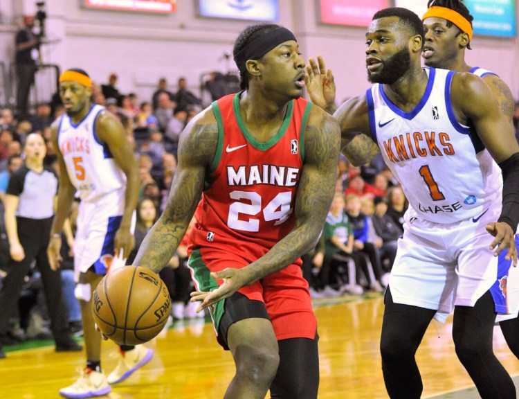 Red Claws guard Archie Goodwin looks to pass in a game at the Portland Expo March. Worcester city officials are hoping they can lure the team to their city once it's sold to the Boston Celtics.