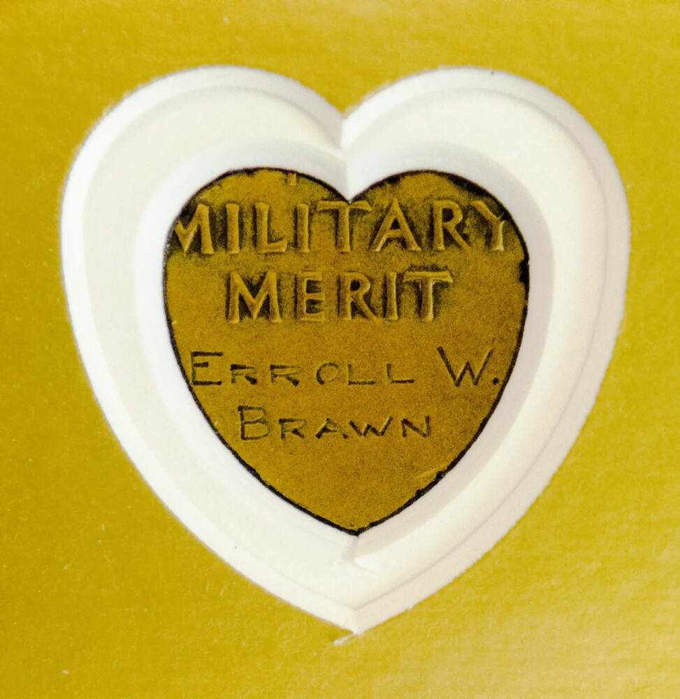 Purple Hearts Reunited presented the medal of Sgt. Erroll Wilbert Brawn to the Maine Army National Guard on Thursday at Camp Chamberlain in Augusta. The frame has a cutout on back so that the inscription is visible.