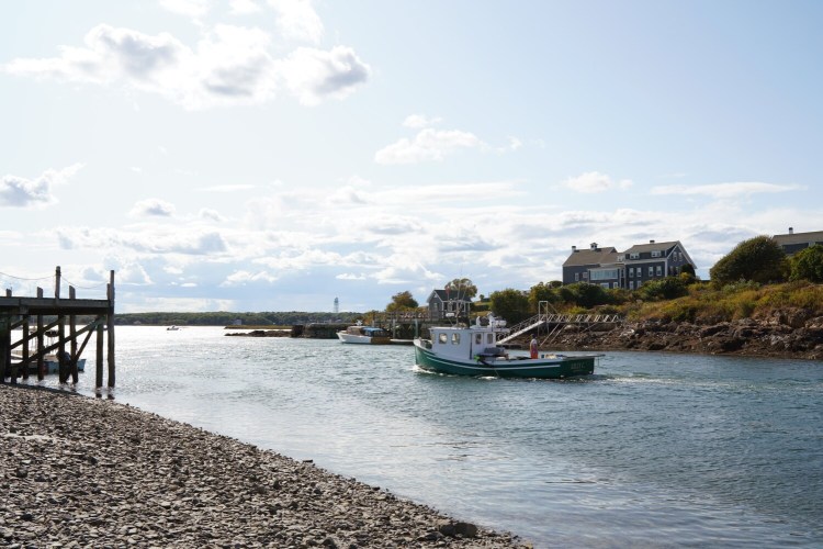 A lobster boat pulls into Biddeford Pool on Tuesday, Sept. 24, 2019. Clam flats in Biddeford Pool have been closed to digging since August and will be closed thru October because of pollution. 