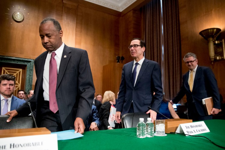 From left, Housing and Urban Development Secretary Ben Carson, Treasury Secretary Steve Mnuchin, and Federal Housing Finance Agency Director Mark Calabria appear before a Senate Banking Committee hearing on Capitol Hill on Tuesday. Mnuchin said last week that the administration is "committed to promoting much needed reforms to the housing finance system that will protect taxpayers and help Americans who want to buy a home."