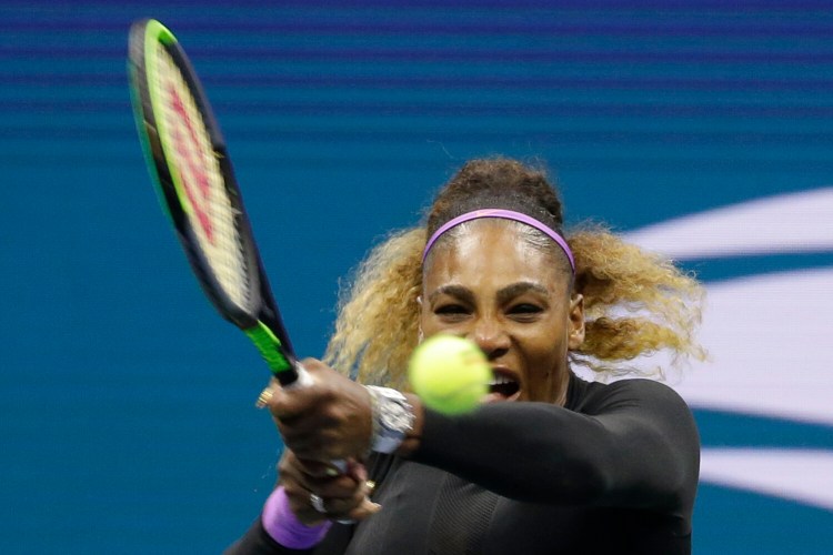 Serena Williams, of the United States, returns a shot to Qiang Wang, of China, during the quarterfinals of the U.S. Open tennis tournament, Tuesday, Sept. 3, 2019, in New York. (AP Photo/Seth Wenig)
