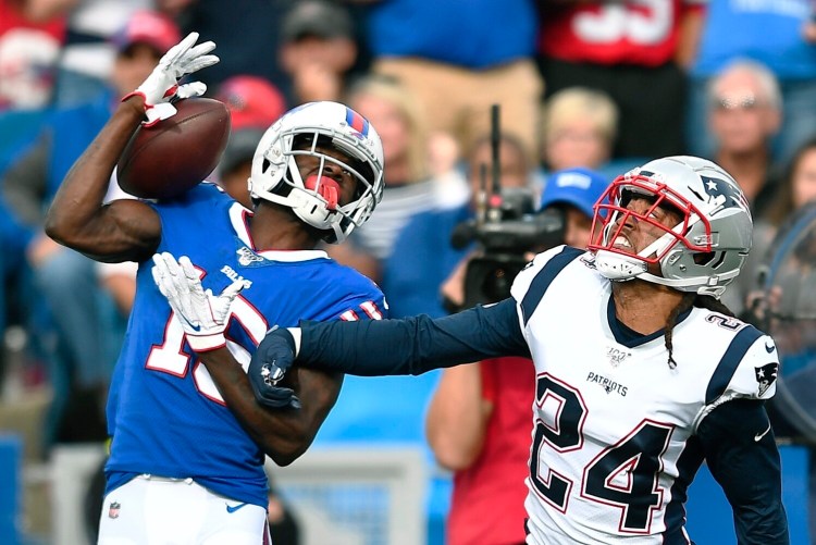 Patriots cornerback Stephon Gilmore defends against Buffalo receiver John Brown during the Patriots' 16-10 win Sunday in Orchard Park, N.Y. The Patriots defense picked up the offense, which struggled to move the ball and score points.