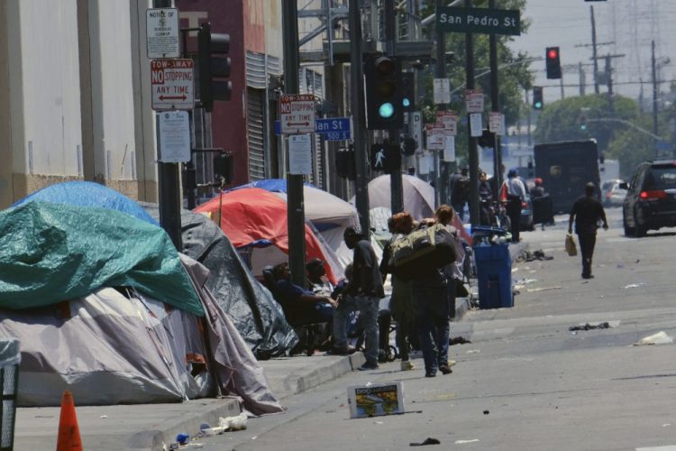 Tents housing the homeless line a street in downtown Los Angeles in May. The Trump administration is still actively exploring options for a crackdown on homelessness aimed at California, a process that has been ongoing for months.
