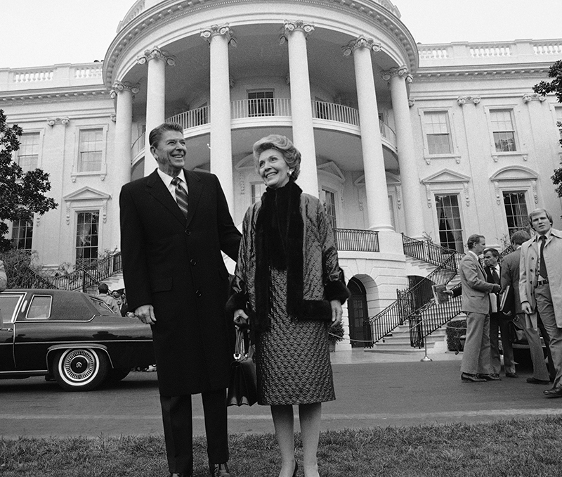 President elect Ronald Reagan and his wife Nancy leave the White House in Washington after their tour Saturday, Dec. 13, 1980. The Reagan's departed for Andrews Air Force Base, Md., for their trip to Los Angeles. (AP Photo)