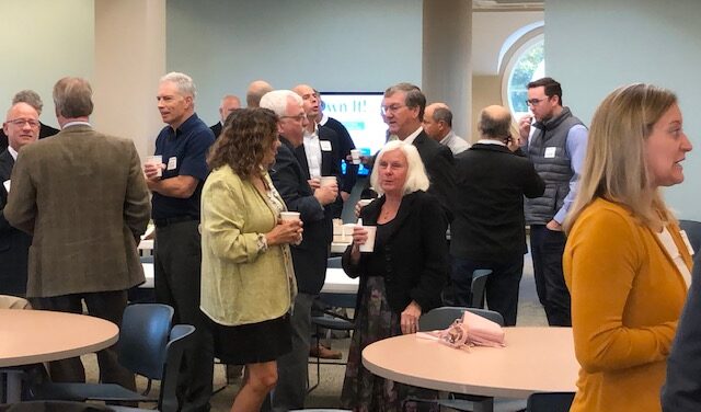 Members of Saco-Biddeford's business community mingle before the inaugural Saco-Biddeford Business Breakfast Forum. Dozens turned out at the People's Choice Credit Union community meeting room to hear experts discuss the area's hot commercial real estate market.