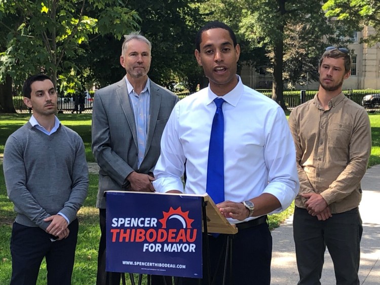 Five Portland city councilors and two former councilors endorse Councilor Spencer Thibodeau for mayor Tuesday. From left to right are Councilor Justin Costa, former Councilor Jon Hinck, Thibodeau and Councilor Brian Batson.