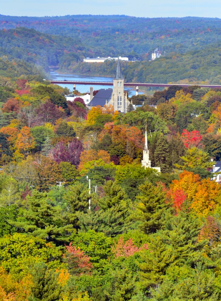 AUGUSTA, ME - OCTOBER 8: St. Augustine Catholic Church seen in front of Kennebec River  on Tuesday October 8, 2019 from scenic overlook in the Howard Hill Historical Park in Augusta. (Staff photo by Joe Phelan/Staff Photographer)