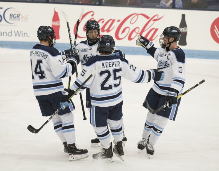 The University of Maine hockey team welcomes transfer defenseman J.D. Greenway this season to try and help offset the losses of  five blue-line regulars, including Brady Keeper (25) and Rob Michel, far right.