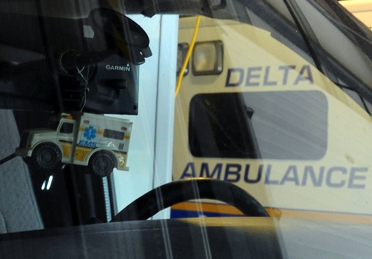 A toy ambulance hangs in October 2019 from the rearview mirror of a Delta Ambulance at the company's facility in Waterville. City officials are looking to expand Waterville's ambulance services, essentially replacing the services Delta has provided for years.