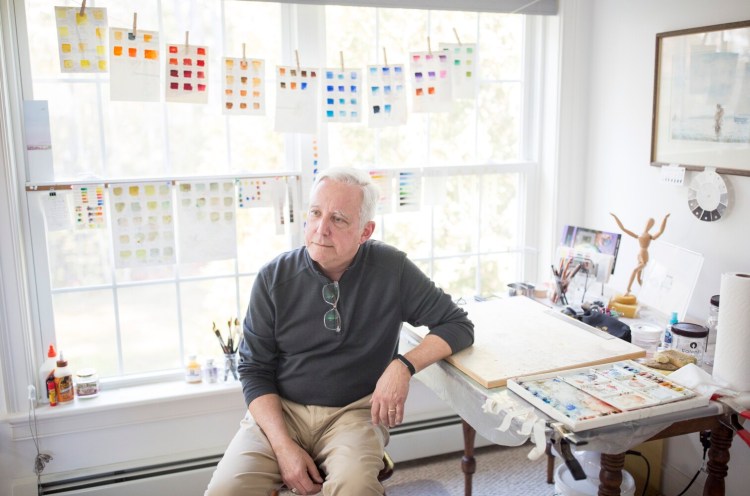 David Pearce at his home painting studio in Yarmouth. Pearce is focusing on his art after a long career as both a diplomat and a journalist overseas.
