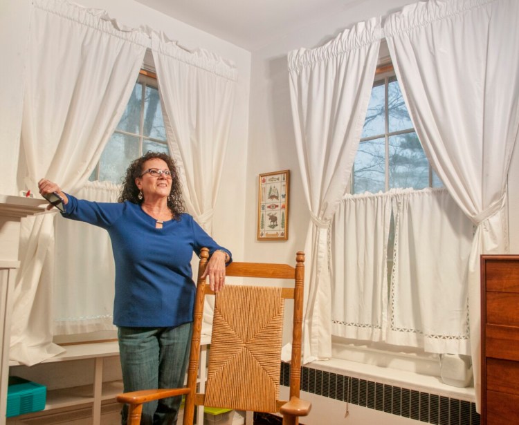 Annette Parlin, a medium/clairvoyant,  said that she saw the ghost of a man looking out of this second-floor bedroom window Oct. 23, during a tour of a Fayette home built in the late-1830s.
