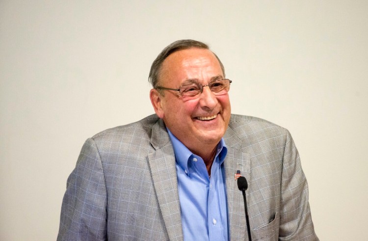 Former Maine Gov. Paul LePage laughs as he fields a question from the audience Wednesday during his talk at Ostrove Auditorium at Colby College in Waterville.
