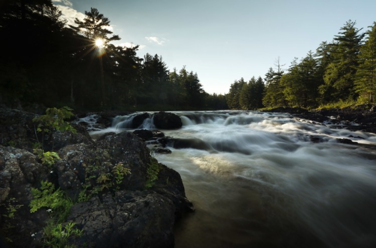 The East Branch of the Penobscot River flows over Pond Pitch in the Katahdin Woods and Waters National Monument in northern Maine. Signs directing visitors to the area are finally being erected.