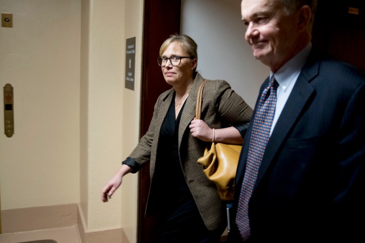 Catherine Croft, a State Department adviser on Ukraine, leaves after testifying at a closed-door meeting as part of the House impeachment inquiry into President  Trump on Capitol Hill in Washington on Wednesday.