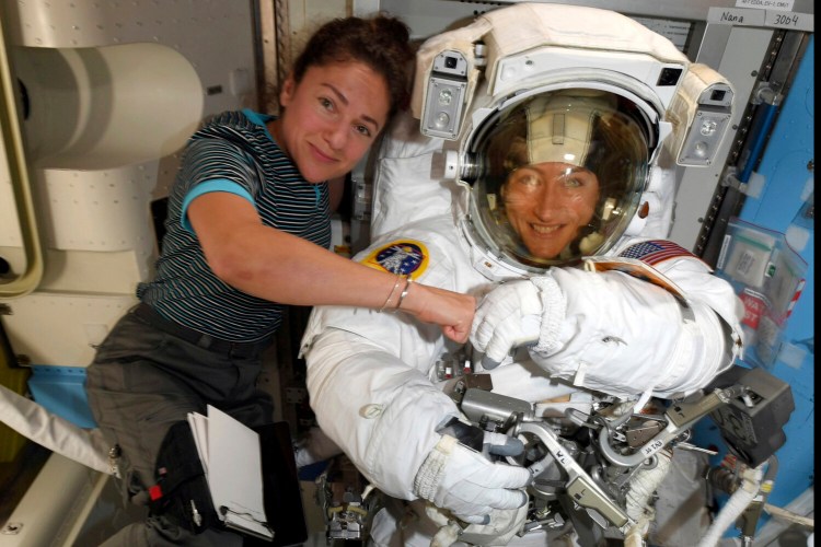 Christina Koch, right, and Jessica Meir at International Space Station in October last year. Koch's 328-day mission will be the second-longest by an American, trailing Scott Kelly's flight by 12 days.