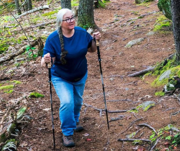 Dorcas Library Director Faith Lane hikes a trail on Schoodic Mountain Sept. 29. 