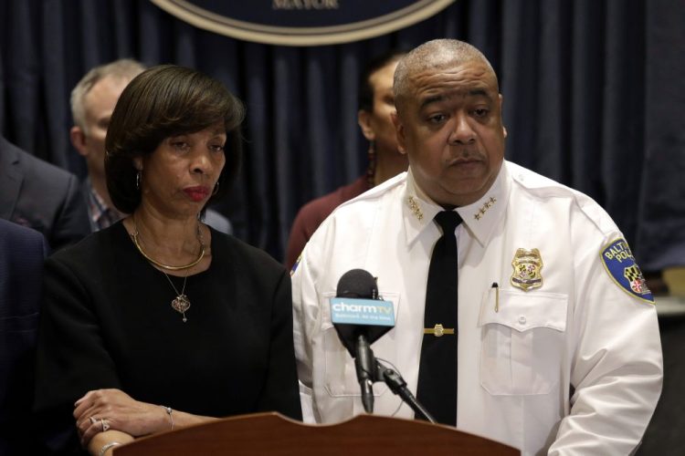 Baltimore Mayor Catherine Pugh and Michael Harrison, acting commissioner of the Baltimore Police Department, speak at a news conference in Baltimore earlier this year. Harrison said the suspect in a 2-year-old's shooting remains at large.