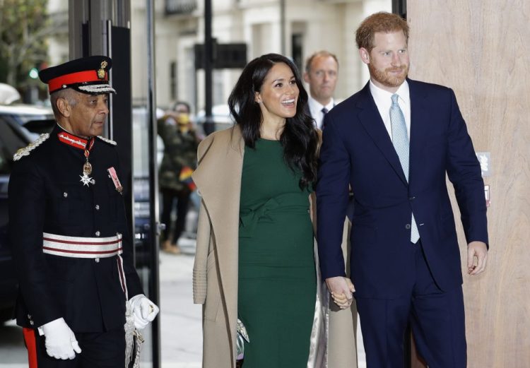 Britain's Prince Harry and Meghan, the Duke and Duchess of Sussex arrive to attend the WellChild Awards Ceremony in London, Tuesday, Oct. 15, 2019. 