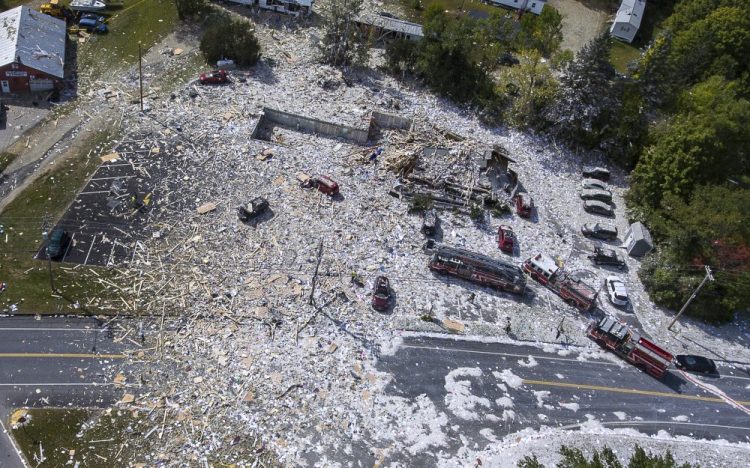 An aerial view shows the devastation after an explosion at the Life Enrichment Advancing People (LEAP) building in Farmington that killed one firefighter and injured multiple others.