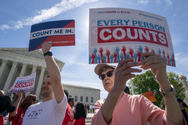 Immigration activists rally outside the Supreme Court on April 23 as the justices hear arguments over the Trump administration's plan to ask about citizenship on the 2020 Census. Worried about internet trolls and foreign powers spreading false news, census officials are preparing to battle misinformation campaigns for the first time in the bureau’s 230-year history.