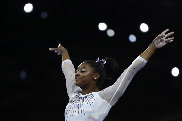 Simone Biles of the United States performs on the vault in the women's all-around final at the Gymnastics World Championships in Stuttgart, Germany, Thursday, Oct. 10, 2019. 