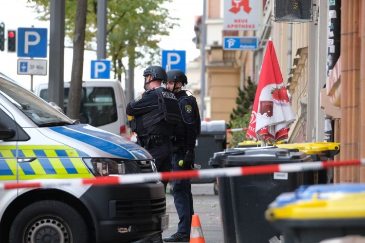 Police officers are on the scene of a shooting in Halle, Germany, on Wednesday that left two people dead.