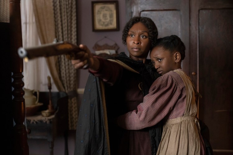 Cynthia Erivo, left, stars as Harriet Tubman and Aria Brooks as Anger (age 8) in "Harriet," a Focus Features release.  
