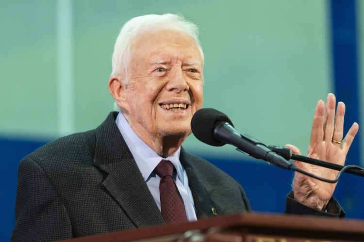 President Jimmy Carter acknowledges a student who's question has been picked for him to answer Sept. 18 during an annual Carter Town Hall held at Emory University in Atlanta. Carter turns 95 on Tuesday. 