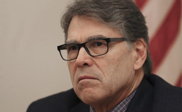 The outgoing U.S. Energy Secretary Rick Perry talks to journalists in Dubai, United Arab Emirates, on Saturday.

