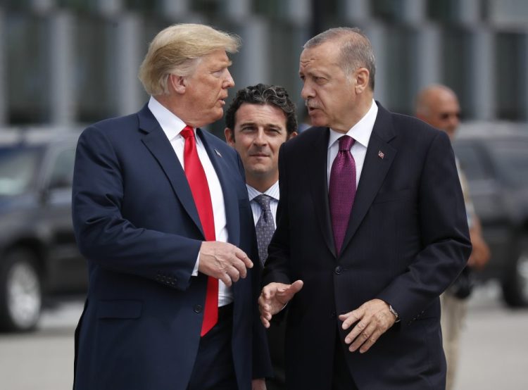 President Trump talks with Turkey's President Recep Tayyip Erdogan in July, 2018.