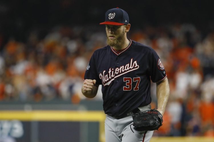 Nationals starter Stephen Strasburg reacts after getting the Astros' Michael Brantley to ground out to end the fifth inning of Game 6 of the World Series on Tuesday night in Houston. Washington won to force a decisive Game 7 on Wednesday night.