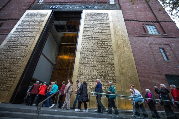 Tourists from Purpose Driven Tours enter the Museum of the Bible in Washington, D.C., in December 2017. 