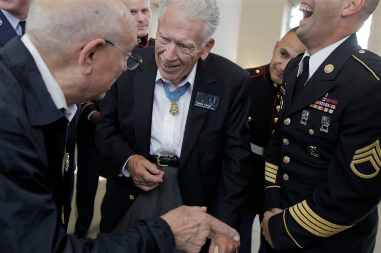Medal of Honor recipients Francis Currey, center, and Hershel Williams, left, at the opening ceremonies of the 2009 Medal of Honor convention.