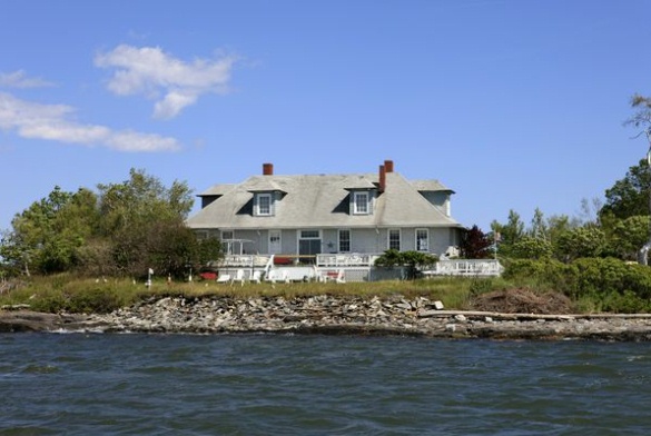 A house on Casco Bay's House Island, where quarantined immigrants received medical care, is part of the property sold last week to a Portland entrepreneur.