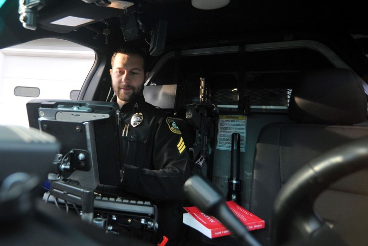 Fairfield police Sgt. Patrick Mank directs an internship program for aspiring officers. Much of the internship program involves field training. Mank directs the training from the front passenger seat of the patrol car, where he is pictured in Fairfield on Monday. 