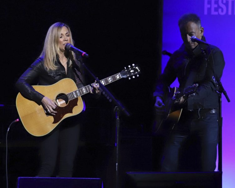 Sheryl Crow, left, and Bruce Springsteen perform at the 13th annual Stand Up For Heroes benefit concert in support of the Bob Woodruff Foundation at the Hulu Theater at Madison Square Garden on Monday, Nov. 4, 2019, in New York.
